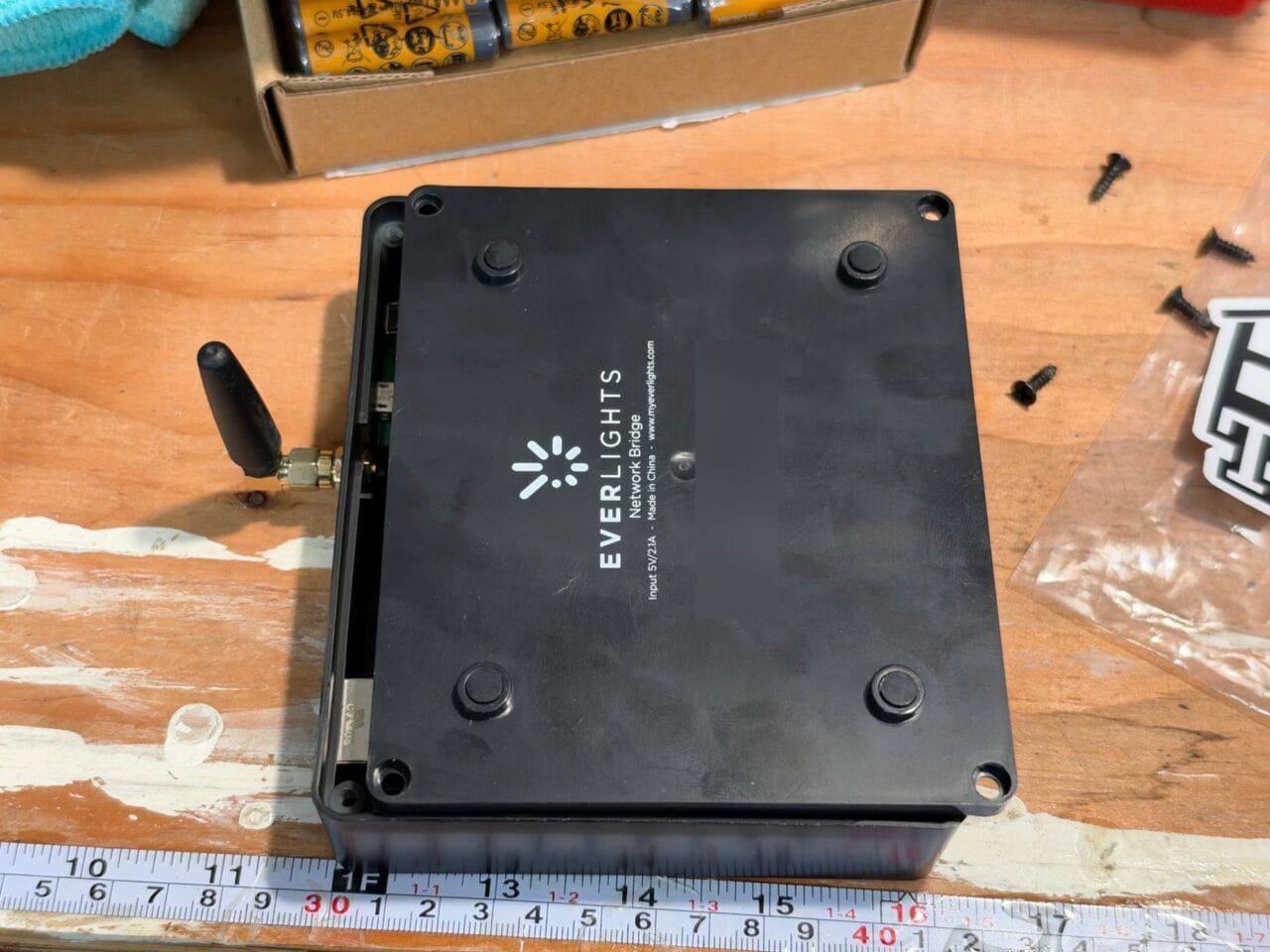 The bottom of the EverLights Network Bridge, with the four corner screws removed